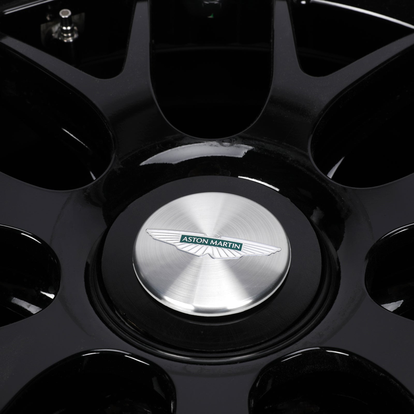 LOT 549 - Aston Martin Aramco Formula One® Team x Movember – Lance Stroll Suit & Wheel Rim