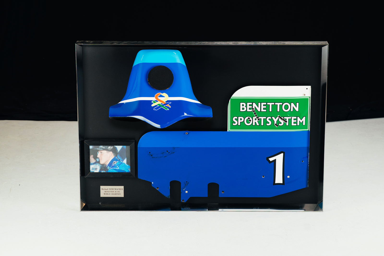 Miami Auction LOT 016 - Michael Schumacher 1995 Benetton B195 Head Rest & Rear Wing Right-Hand Endplate –  Signed Framed