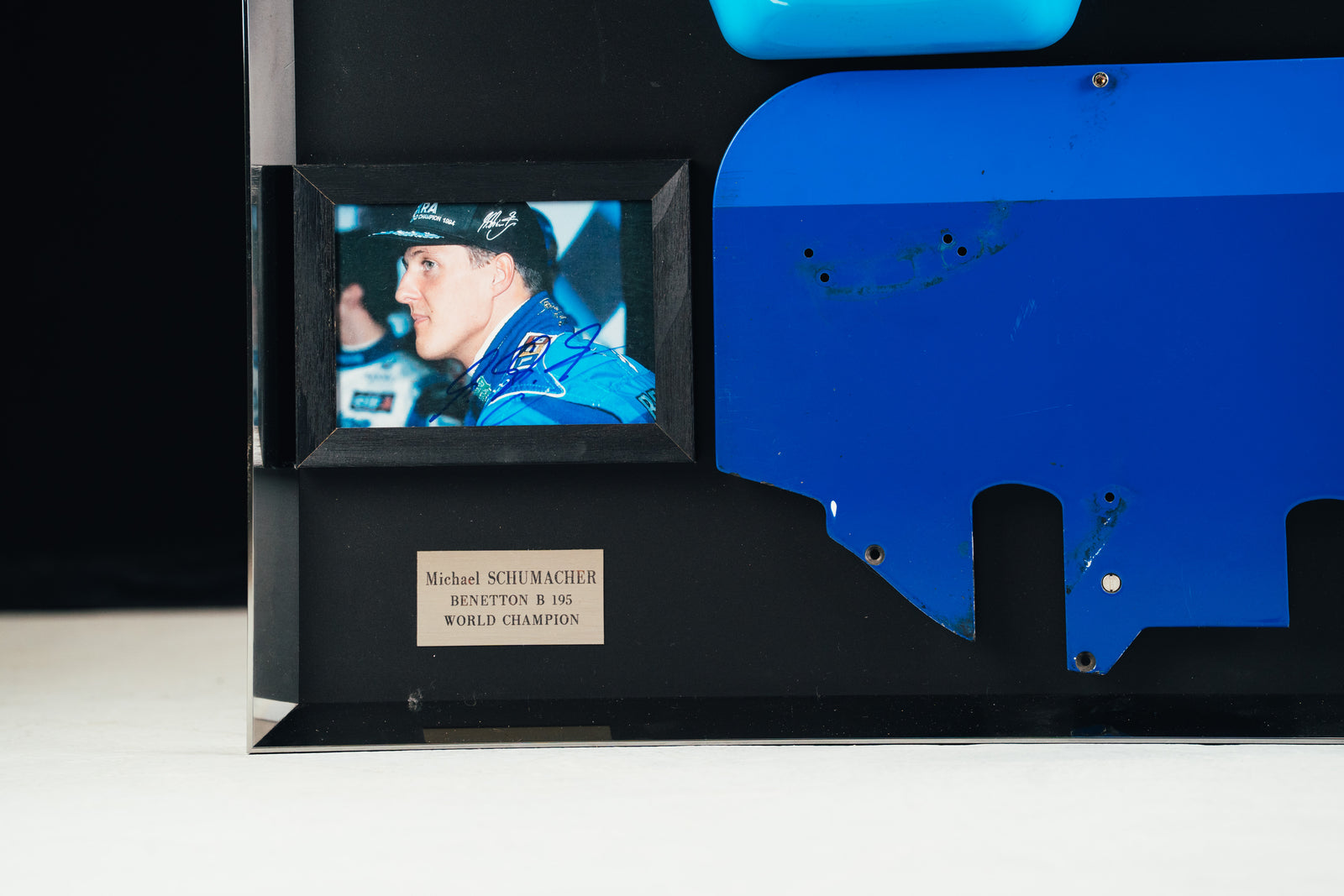 Miami Auction LOT 016 - Michael Schumacher 1995 Benetton B195 Head Rest & Rear Wing Right-Hand Endplate –  Signed Framed