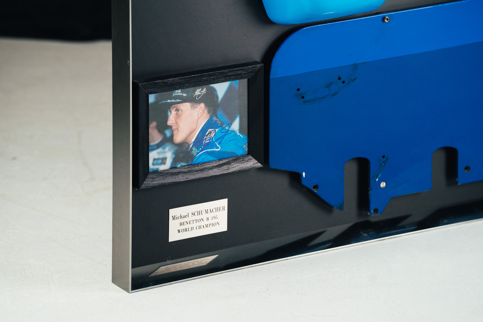 Miami Auction LOT 016 - Michael Schumacher 1995 Benetton B195 Head Rest & Rear Wing Right-Hand Endplate –  Signed Framed