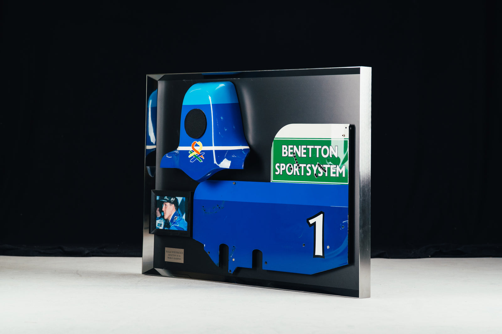 Miami Auction LOT 016 - Michael Schumacher 1995 Benetton B195 Head Rest & Rear Wing Right-Hand Endplate –  Signed Framed