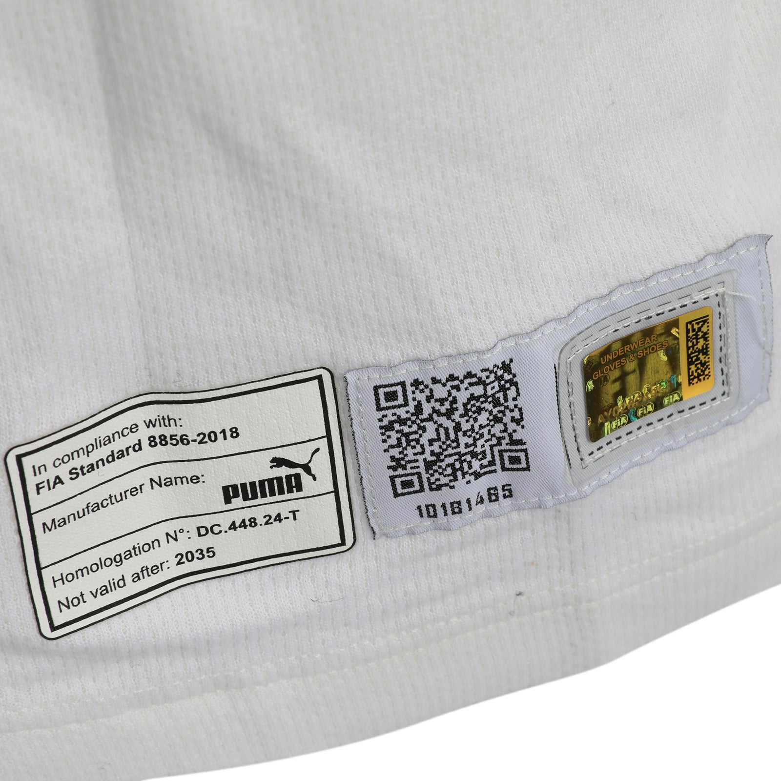 Auction LOT 036 - Fernando Alonso 2025 Aston Martin Aramco F1 ® Team White Nomex