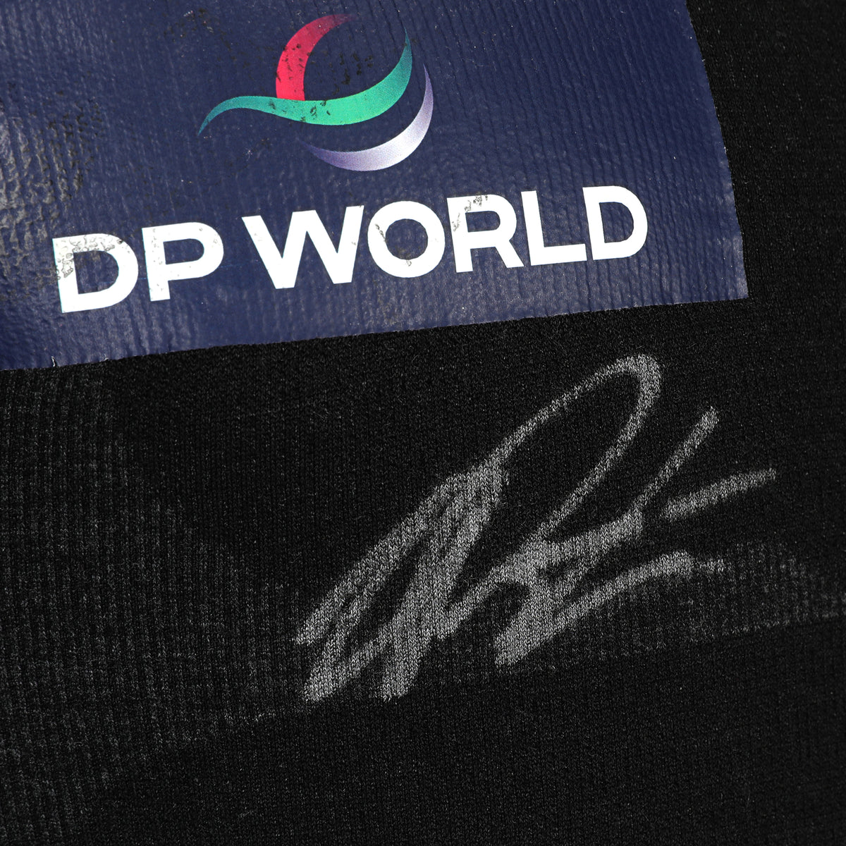 The Austin Auction LOT 018 - Lando Norris 2024 Japanese GP Race-Used Nomex – Signed by Lando Norris & Oscar Piastri