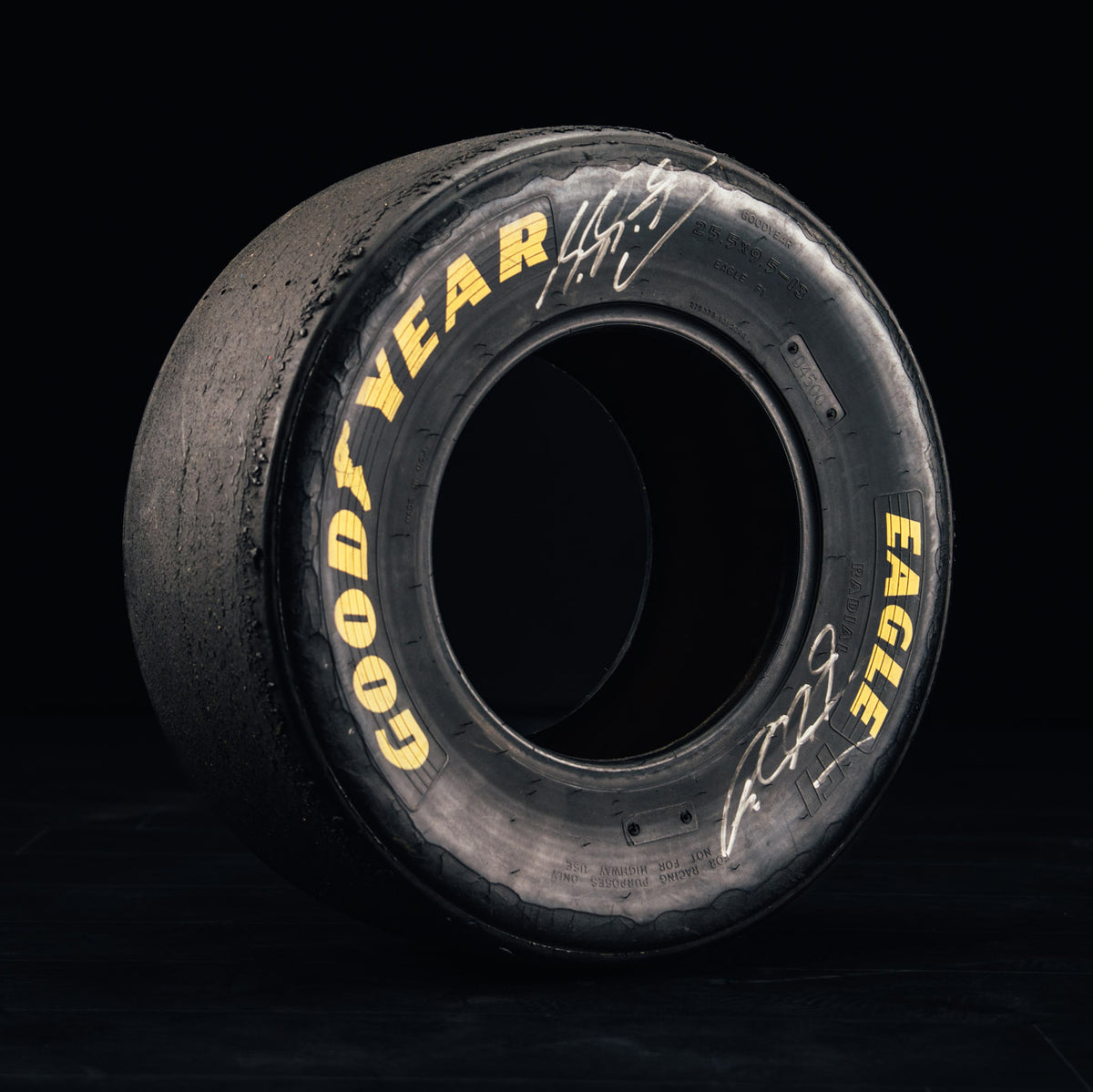 The Austin Auction LOT 044 - Michael Schumacher 1990s Goodyear Eagle F1 Slick Front Tyre - Signed