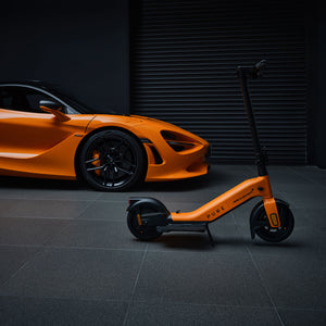 Pure x McLaren Papaya Edition electric scooter featuring iconic McLaren-inspired colours, premium urban transport with striking styling