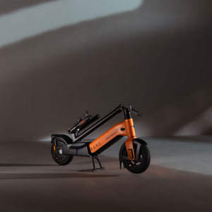 Pure x McLaren Papaya Edition e-scooter, stylish electric scooter combining McLaren-inspired aesthetics with practical urban mobility