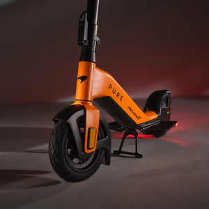Pure x McLaren E-Scooter – Papaya Edition, premium McLaren-inspired electric scooter with iconic papaya finish for city commuters and enthusiasts