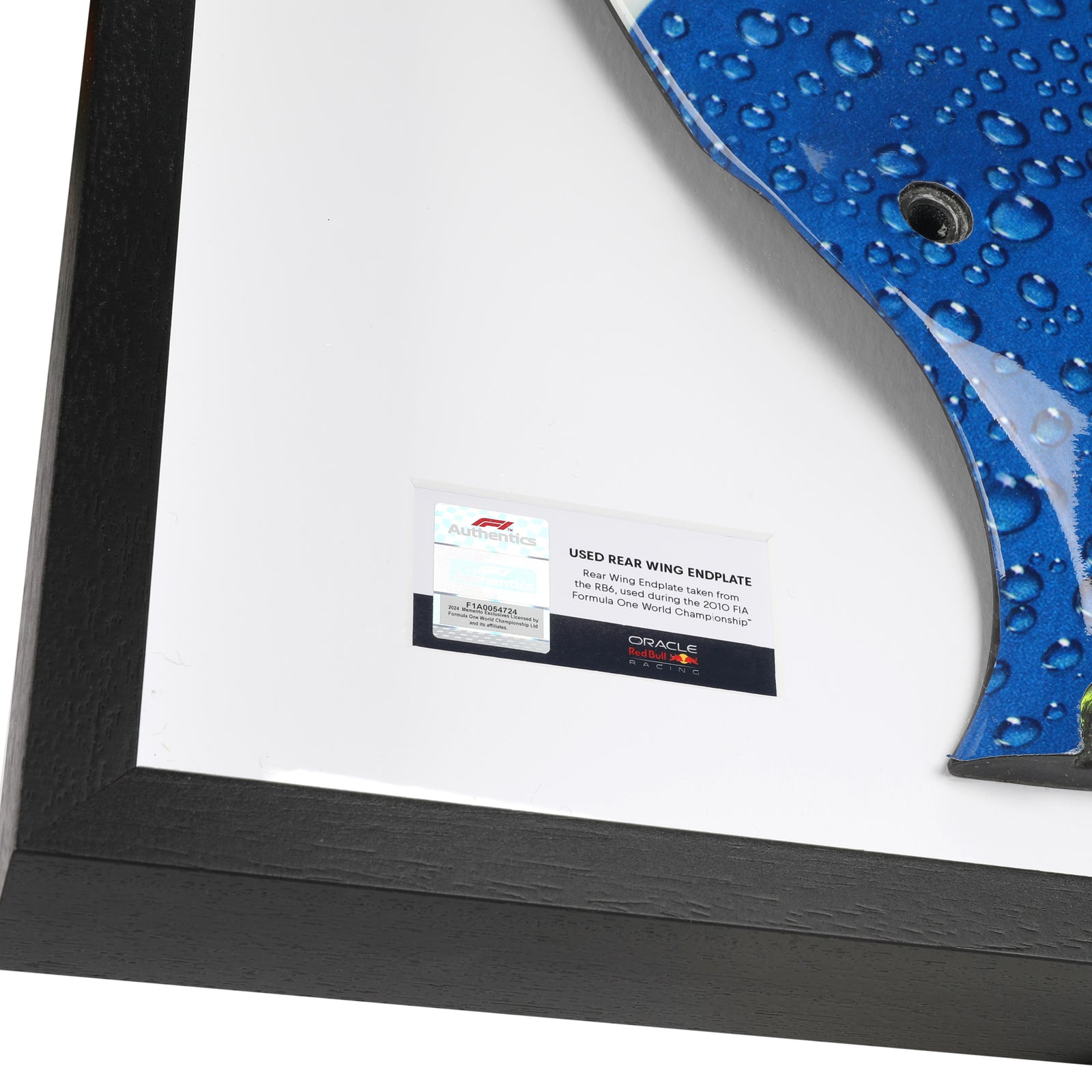 Genuine Red Bull Racing RB5 2009 Grand Prix-used left-hand rear wing endplate with Red Bull branding, premium Formula 1 collector display
