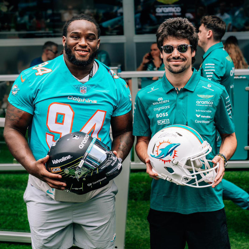 Aston Martin Aramco Formula One™ Team x Miami Dolphins - Lance Stroll Signed Helmet and Jordan Phillips Signed Football Helmet, presented by Atlas Air Worldwide