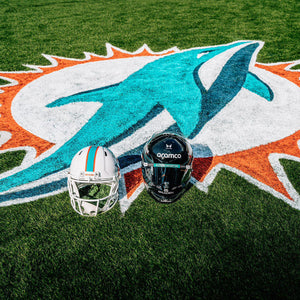 Aston Martin Aramco Formula One™ Team x Miami Dolphins - Lance Stroll Signed Helmet and Jordan Phillips Signed Football Helmet, presented by Atlas Air Worldwide