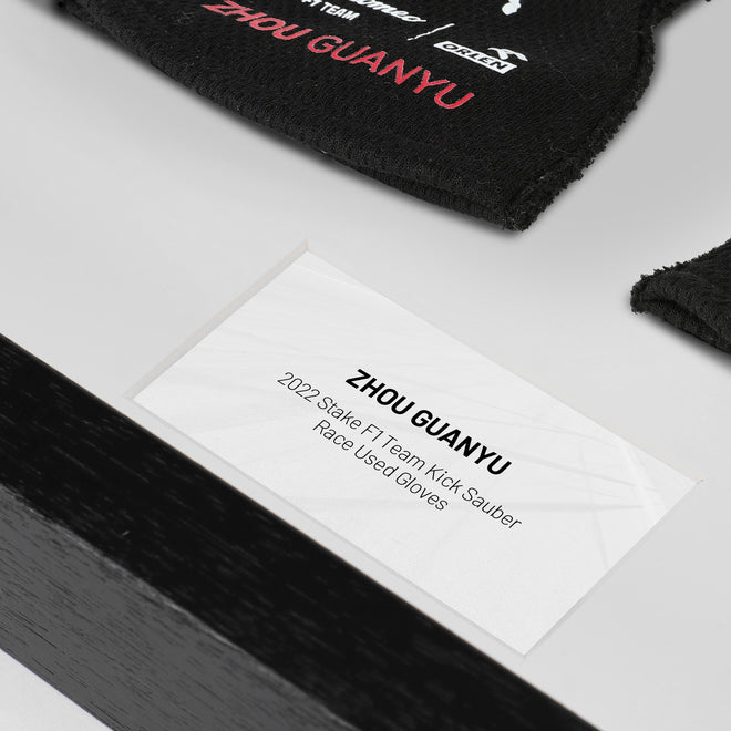 The Austin Auction LOT 040 - Zhou Guanyu 2022 Stake F1 Team Kick Sauber Race Used Gloves 